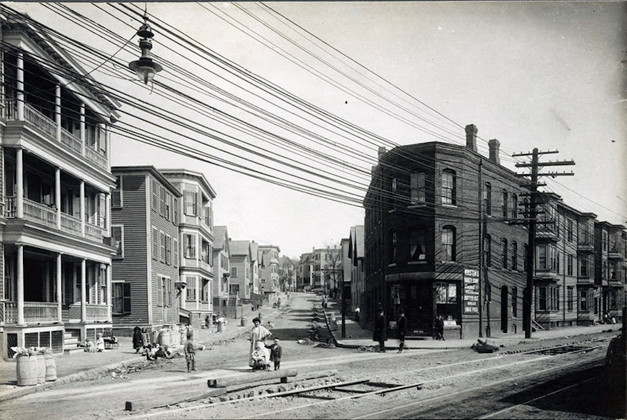 Working-class immigrant neighborhood in downtown Lynn, looking up Amity Street from Washington Street, 1890.
