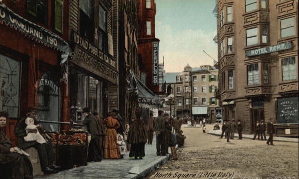 Colored postcard showing bustling sidewalks in the North End.